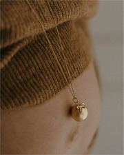 Pregnancy bola Link Yellow gold colour on chain  Ilado
